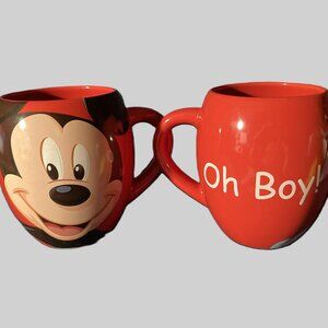 Disney Parks ceramic coffee mugs (2) features the iconic Mickey Mouse.